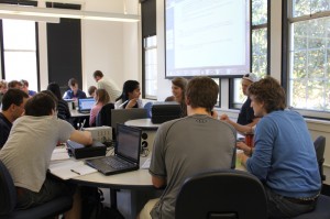 SCALE-UP classrooms in physics turn a traditional lecture class into a workshop setting. (Photo by Kristen Chavez) 