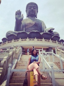 Jashawnna Gladney poses with the 'Big Buddha' at Po Lin monastery.