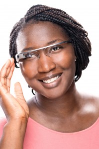 Doctoral student Femi Alabi is wearing Google Glass. As computer science celebrates its 50th anniversary, scientists are looking back over a half-century of high-tech changes. (photo by Steve Exum)