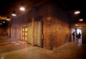 Spacious hallways and log beams are part of the renovated mill project. 