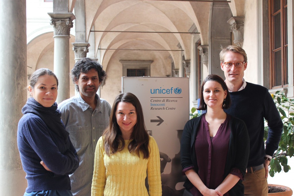 Public policy professor Ashu Handa (second from left) with UNICEF researchers based in Italy. (photo by Michelle Mills)