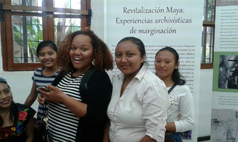 Museums Connect mentor Raina Enrique (senior at UNC-Chapel Hill) with students from the Universidad de Oriente de Yucatan at the opening of their exhibit at the State Archives of Yucatan. (photo courtesy of Gabrielle Vail)