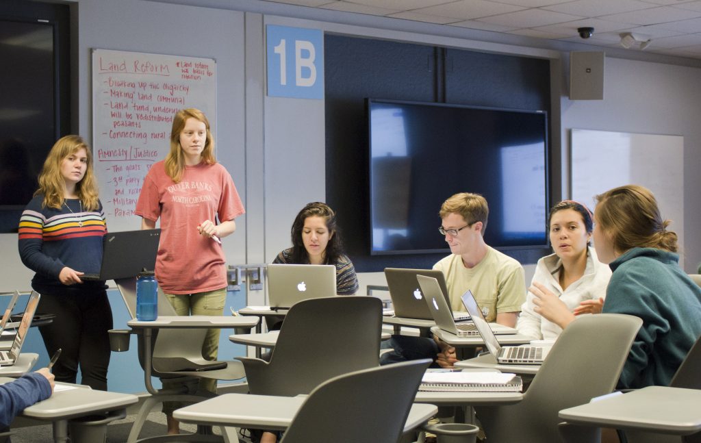 Students participate in a history class in Greenlaw 101, which was remodeled to introduce interactive technology and flexible student seating for collaborative work. (photo by Kristen Chavez)