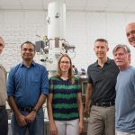 Staff members Wallace Ambrose, Amar S. Kumbhar and Carrie Donley support the nanocomposites research of professors Theo Dingemans, Greg Forest and Peter Mucha —producing high-resolution images of carbon nanotubes embedded in crystalline polymer. They stand in front of equipment in the Chapel Hill Analytical and Nanofabrication Laboratory.