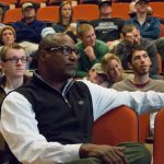 Bernard Bell watches student presentations in “Principles and Practice,” a course that focuses on core entrepreneurial skills including innovation, creative design, customer development and team dynamics.