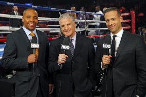 Andre Ward, Jim Lampley and Max Kellerman commentate on the side of the ring at the HBO World Championship Boxing card.